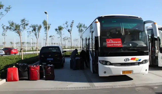 Escorted to your Shared Coach outside the Terminal