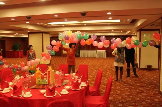 Decorating the hall with coloured ballons