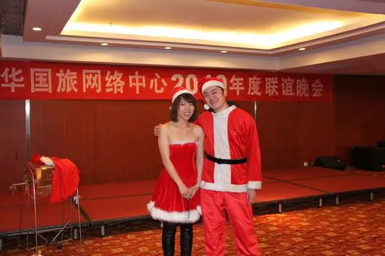 Ms Flora Zhao is our party presenter. She is in charge of presenting the lottery prizes anyone wins; Mr. Johny Hao is in charge of the main registration.