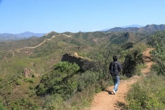 The Ming Dynasty Wall in the north runs shoulder to shoulder to the Qi Dynasty Wall under our feet.