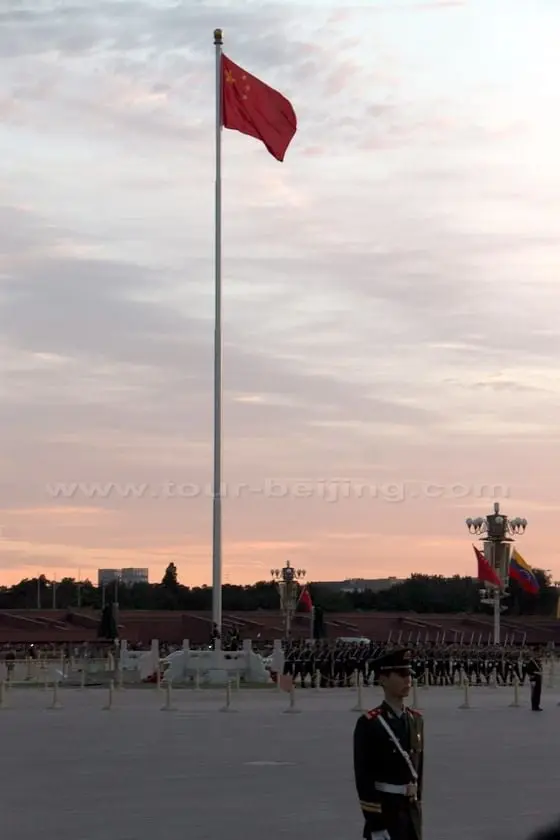 A fully raised national flag.