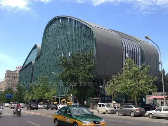 A modern Buidling with with green facade