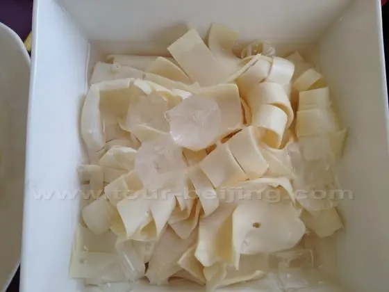 A plate of sliced beef throats