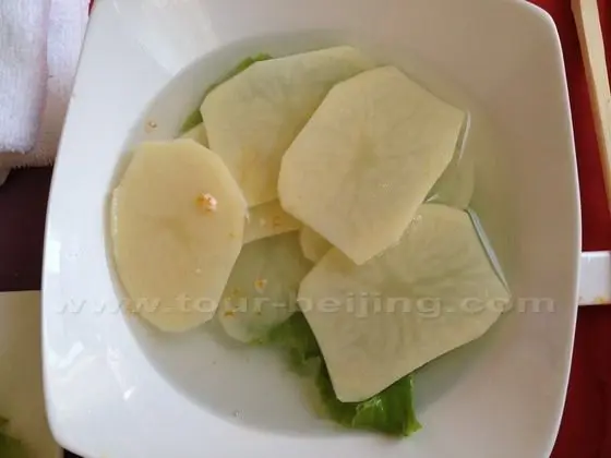 A plate of slices potatos