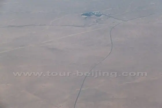 A train rail snake across the desert
