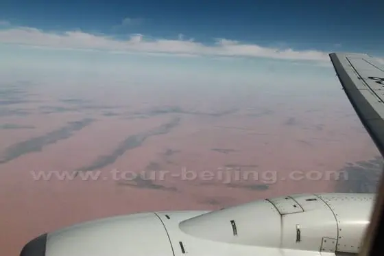 Again the boundless desert