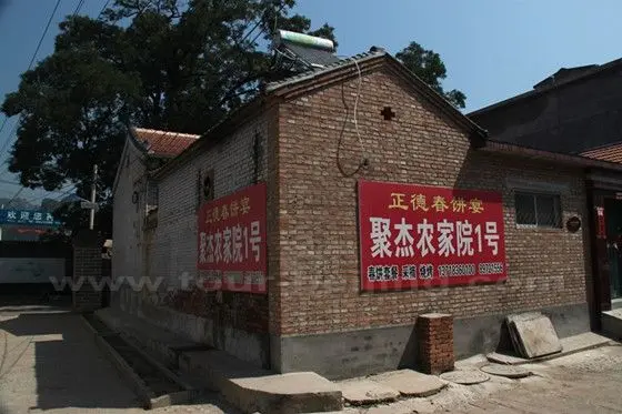 Almost each household has an adviserment for local pancakes by posting a huge signboard on its wall.