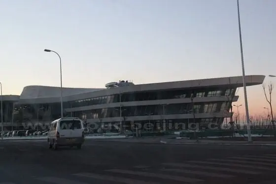 At 7am the Diamond behind the Tianjin Cruise Terminal Building