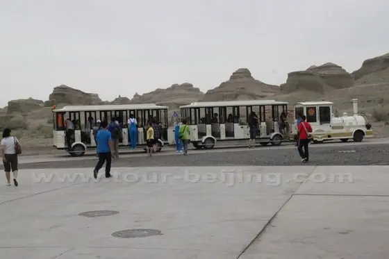 Board a diesel powered train for one hour circular tour of the huge Ghost Town, a natural museum of Yadan landform.