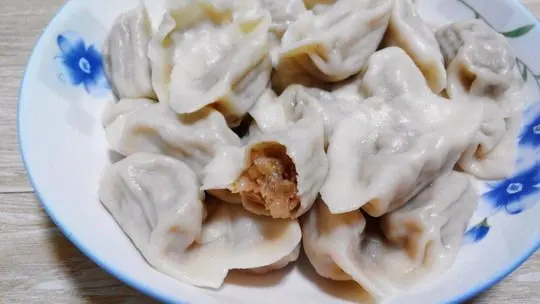 Boiled Suan Cai Jiaozi