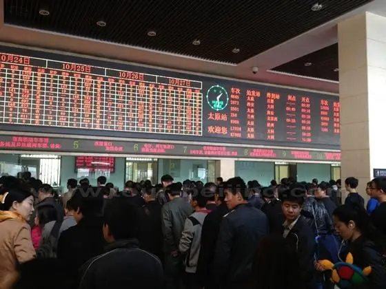 Buying train tickets in the ticketing hall