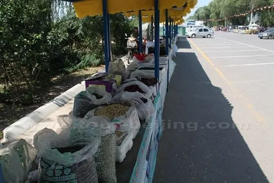 By the parking lot, local villlages sell the local specialities.