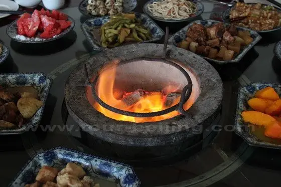 Charcoal stoves are used to cook tofu