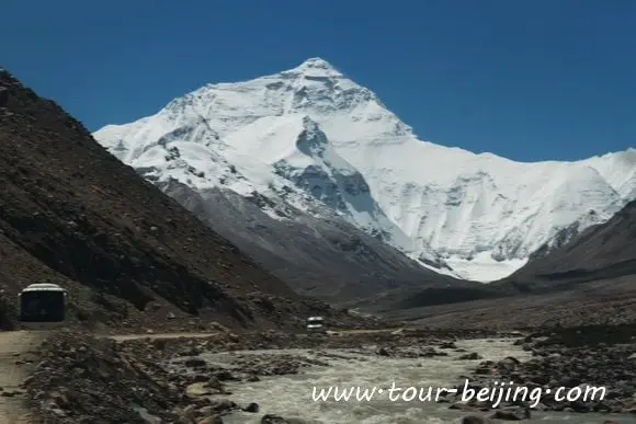 We continue to drive and the huge chunk of Mt.Everest is looming over us.