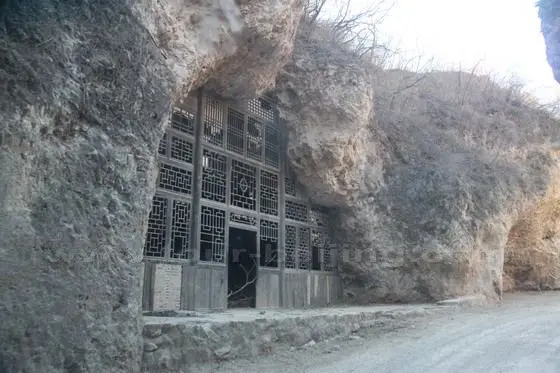 Driving by a - yaodong - an abandoned Dwelling Cave.
