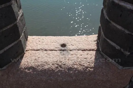 Each crenel has a small hole for supporting a crossbow