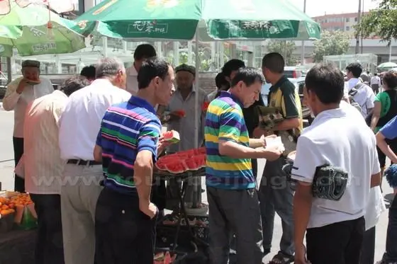 Eat Sliced Water Melons on a fruit vendor