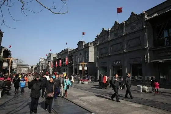Flank ing the street are restored old buildings, a reproduction of the old houses and building in the late Qing and the Republic era.