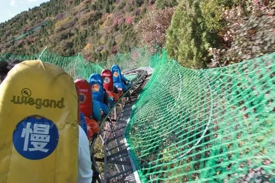 Flyong down on toboggan