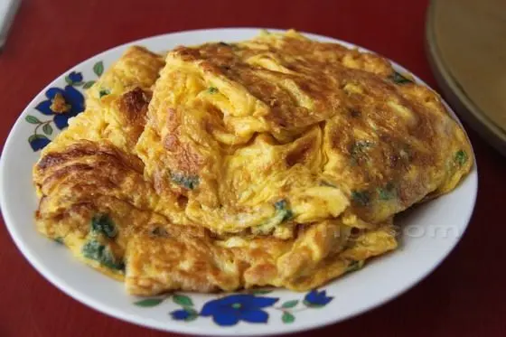 Fried eggs produced by his own backyard chickens