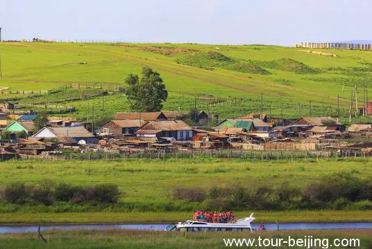 Zoom in for a close look at the village on the Russian side.