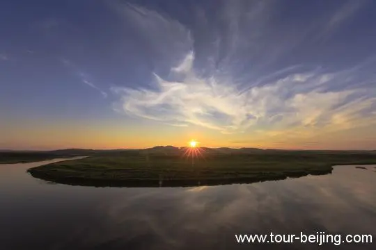 Catch the glowing sunset over the big curve