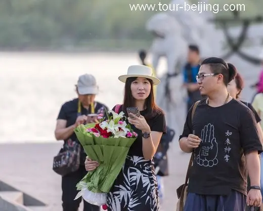 A smart girl with a bunch of flowers