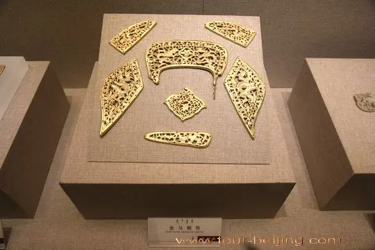 The gold saddles on display.