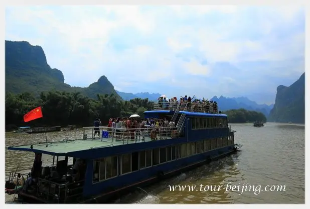 Li River is flanked by pinnacled peaks