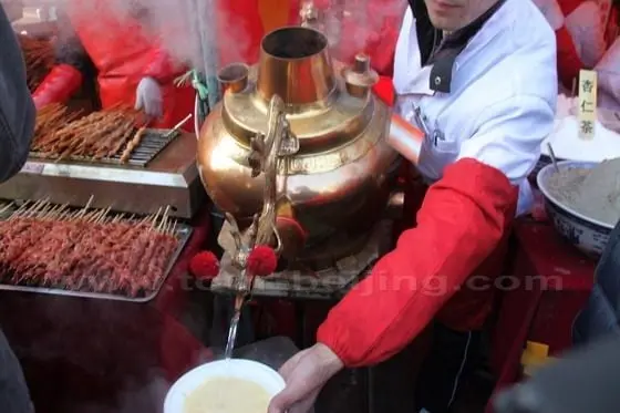 Have a cup of tea from a huge copper tea pot
