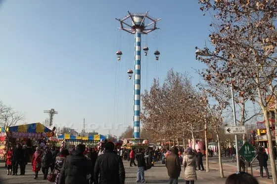 Having a panoramic view of Beijing city by taking a parachute.