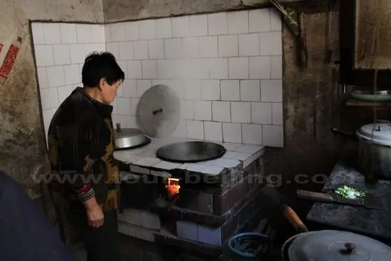 His wife is cooking lunch