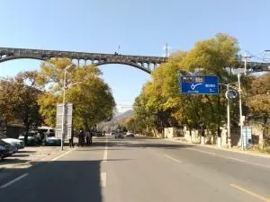 Mutianyu Roundabout is recognizable because of the big aqueduct bridge overhead.
