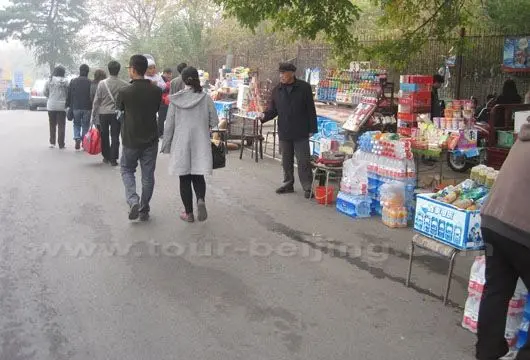 The traders on the right side of the road cried out to sell us things.