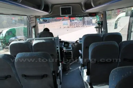It is a tourist low season and I'm the only passenger on the shuttle bus.