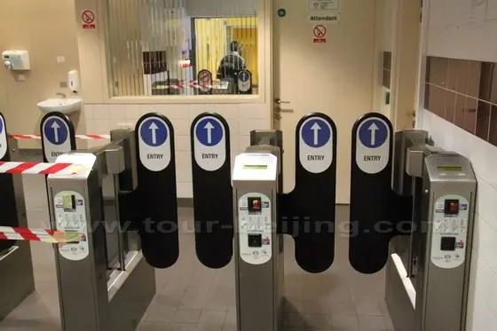 Insert the 50 pennies and enter the loo.