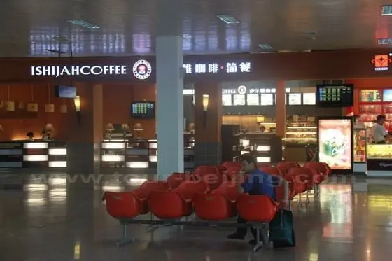 Inside the domestic terminal, on the right is a coffee shop also offering snacks.