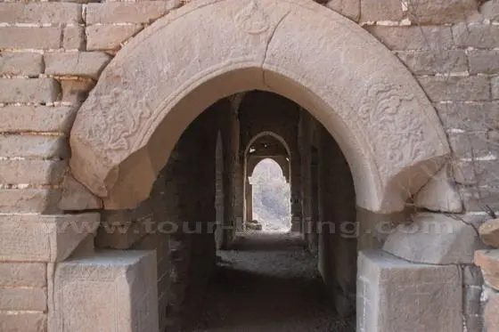 Its door is carved with beautiful flower designs.