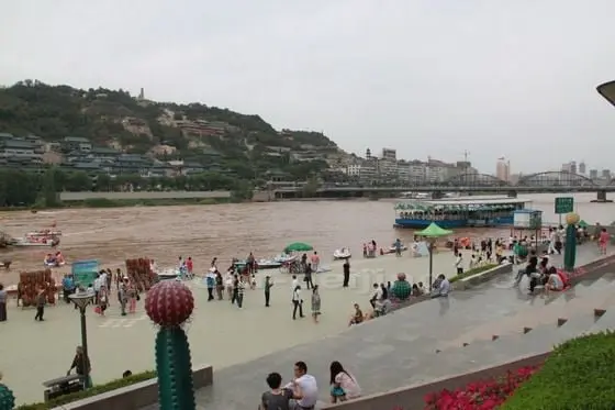 Lanzhou is long and spread along the southern bank of the Yellow River.
