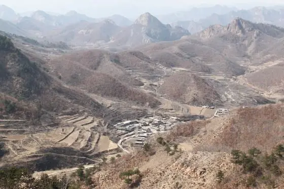 Look down from the fort, we see Xiaohekou Village