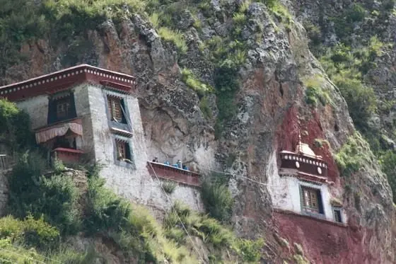 More temple houses clung to the hillside