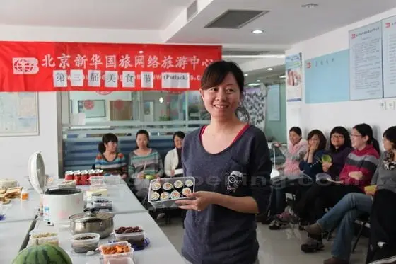 Ms Songdan is showing her own masterpiece - sushi.
