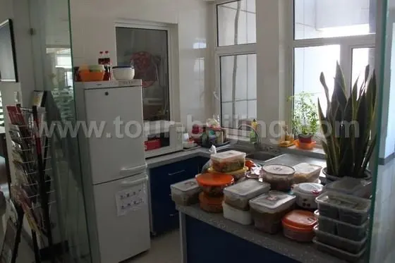 Our office kitchen is piled with pre-made Chinese dishes.