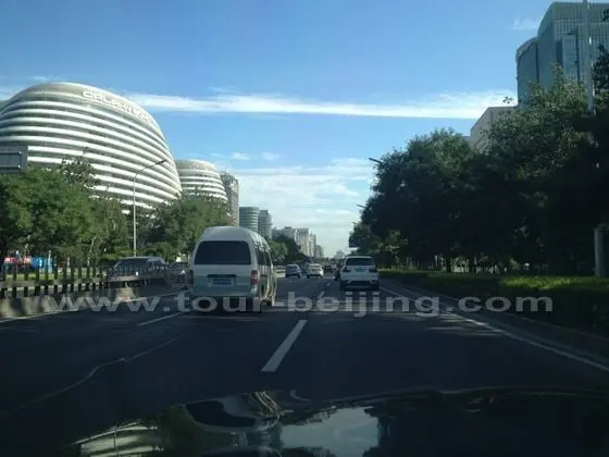 The round buildings on the left of the secong ring road is Galaxy Soho.