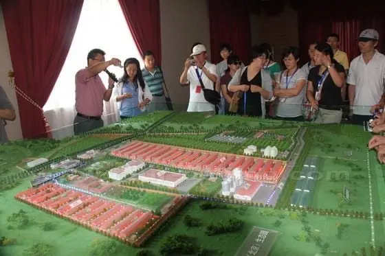 One member of its staff gives us a brief introduction to the layout of DQY Eco-farm.