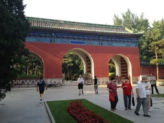 Outside the north gate to Ritan Park and most of the early risers are retired senior citizens.