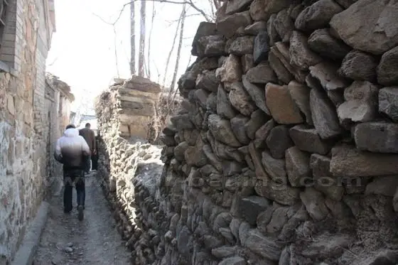 Passing through a narrow lane in the village.