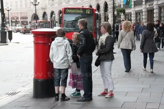 People using the Red Post Box