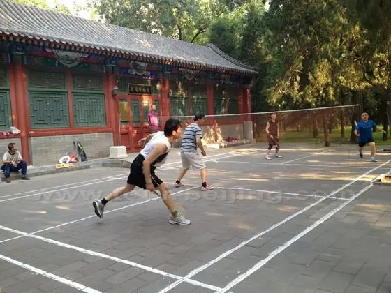 Playing badminton by the side of the Sun Altar Museum