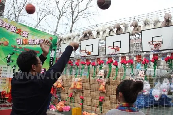 Put the ball into the rim and get a toy